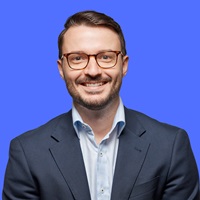 Matthew Hollings - Person with glasses smiling