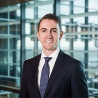 Robert O’Grady - Profile photo of a person in a suit